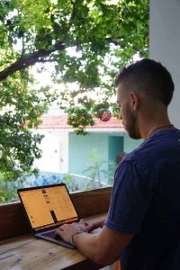 digital nomad working on laptop